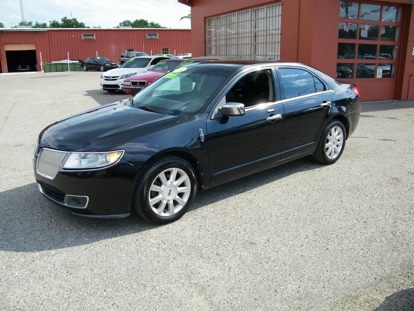 2011 Black /Black Lincoln MKZ FWD (3LNHL2GC0BR) with an 3.5L V6 DOHC 24V engine, 6-Speed Automatic transmission, located at 4000 Bee Ridge Road, Sarasota, FL, 34233, (941) 926-0300, 27.298664, -82.489151 - Photo#2